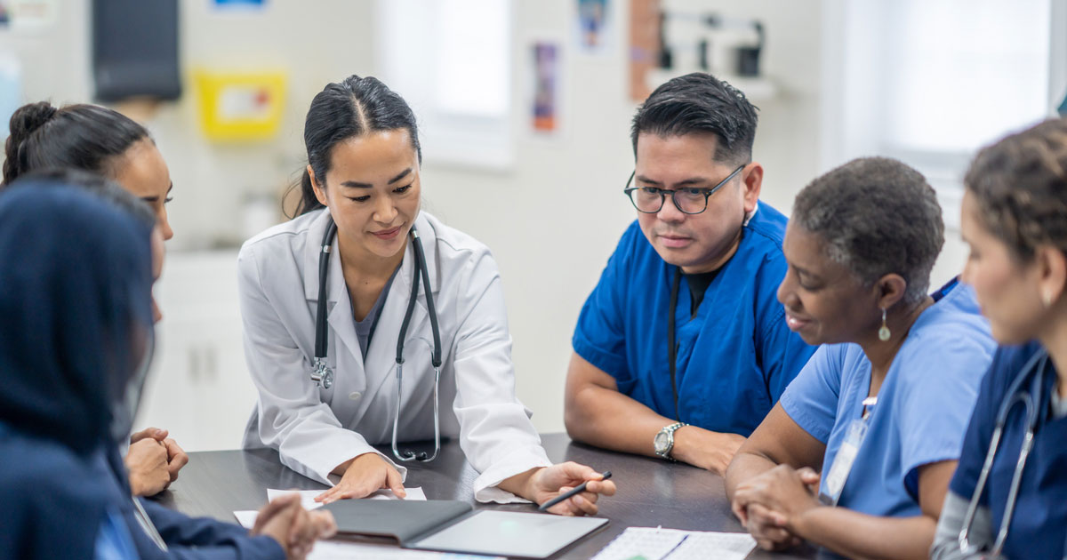 Patient consulting with a clinician about specialist options